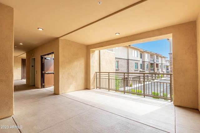 view of patio featuring a balcony