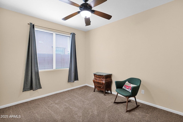 unfurnished room with carpet floors, baseboards, and a ceiling fan