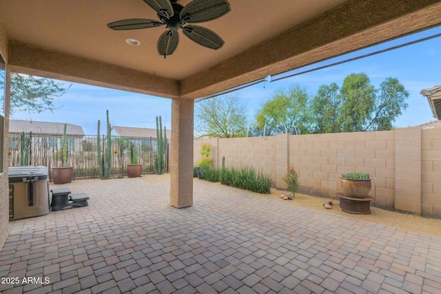 view of patio with ceiling fan and a fenced backyard