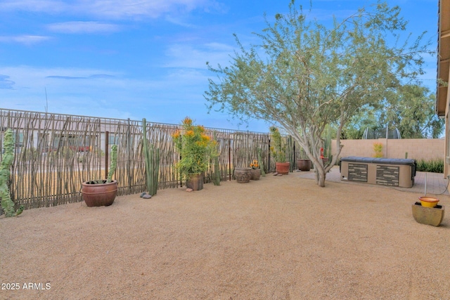 view of yard featuring a patio and a fenced backyard