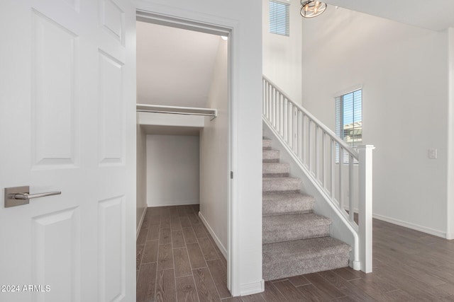 stairway with wood-type flooring