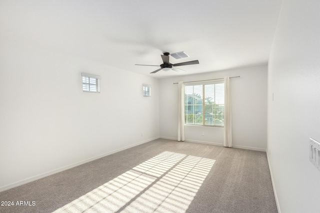 carpeted empty room with ceiling fan