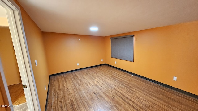 30940 N Varnum Rd, San Tan Valley, AZ 85143 - spare room with wood finished floors and baseboards