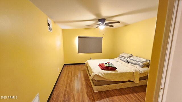 30940 N Varnum Rd, San Tan Valley, AZ 85143 - bedroom featuring wood finished floors and a ceiling fan