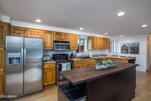 30020 N 63rd St, Cave Creek, AZ 85331 - kitchen with butcher block countertops, recessed lighting, stainless steel appliances, and a sink