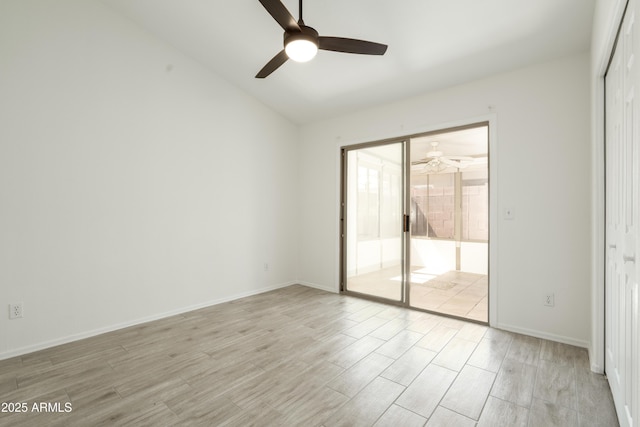 64 N 63rd St N Unit 33, Mesa, AZ 85205 - spare room featuring ceiling fan, light wood-style floors, and vaulted ceiling