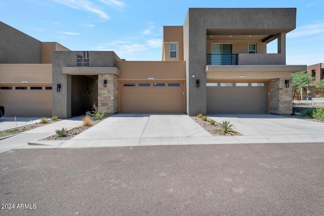 view of front of home with a balcony