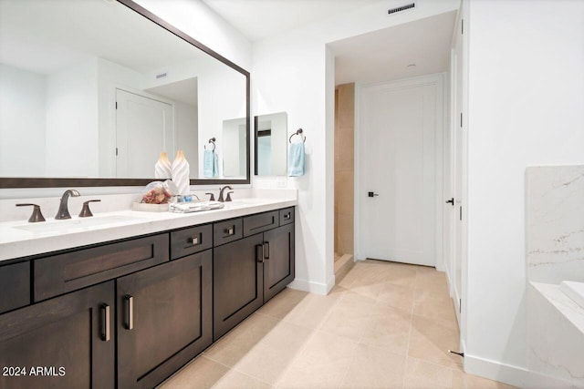 bathroom featuring vanity and tile patterned floors