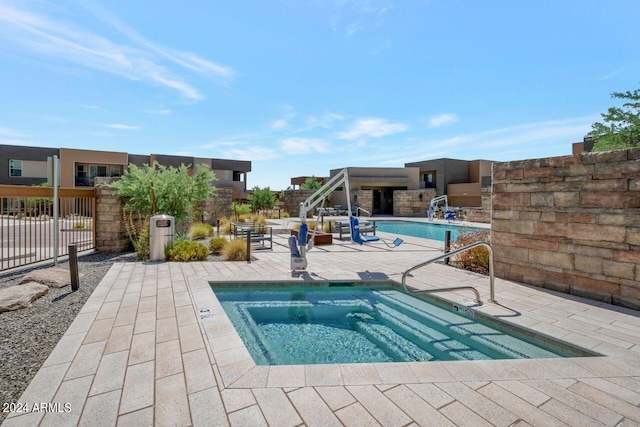 view of pool featuring a patio area