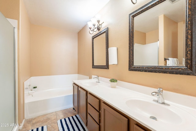 15211 N 89th Ave, Peoria, AZ 85381 - bathroom featuring a garden tub, double vanity, and tile patterned floors