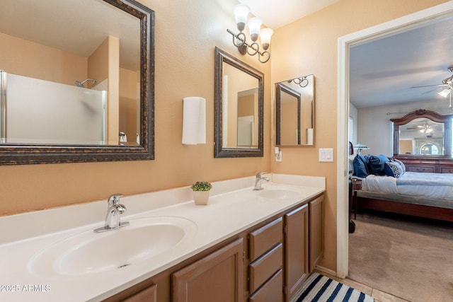 15211 N 89th Ave, Peoria, AZ 85381 - bathroom featuring double vanity, a ceiling fan, ensuite bath, and a shower