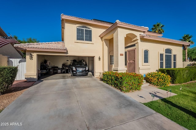 15211 N 89th Ave, Peoria, AZ 85381 - mediterranean / spanish house featuring a tile roof, driveway, and stucco siding