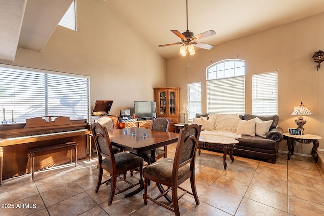 15211 N 89th Ave, Peoria, AZ 85381 - dining room with high vaulted ceiling, a ceiling fan, and light tile patterned floors