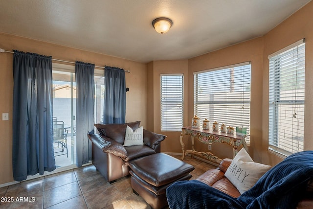 15211 N 89th Ave, Peoria, AZ 85381 - living room with tile patterned flooring and baseboards