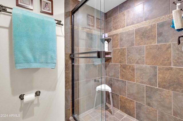 bathroom featuring an enclosed shower