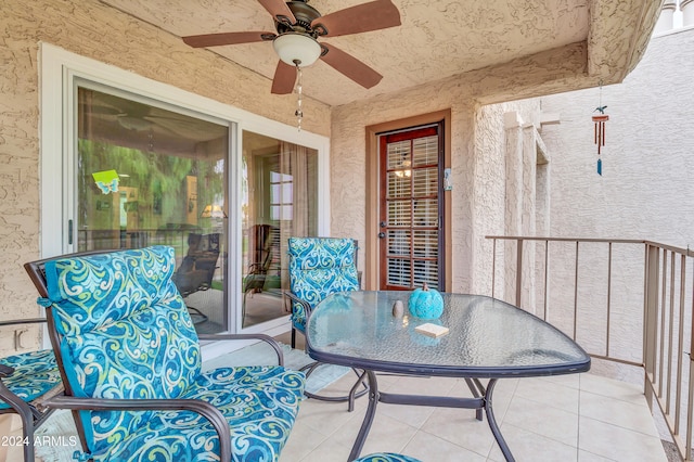 balcony featuring ceiling fan