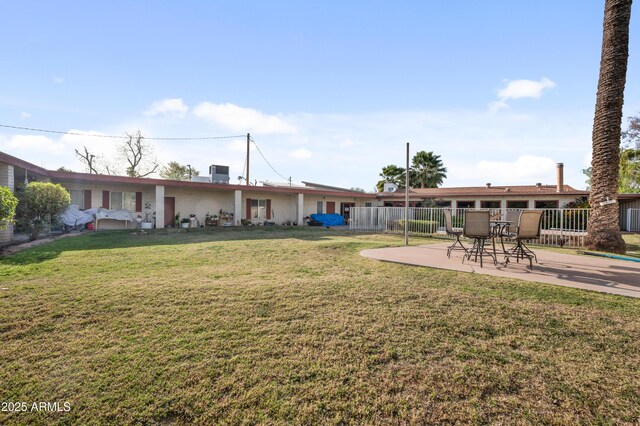 4461 E Flower St, Phoenix, AZ 85018 - view of yard with a patio