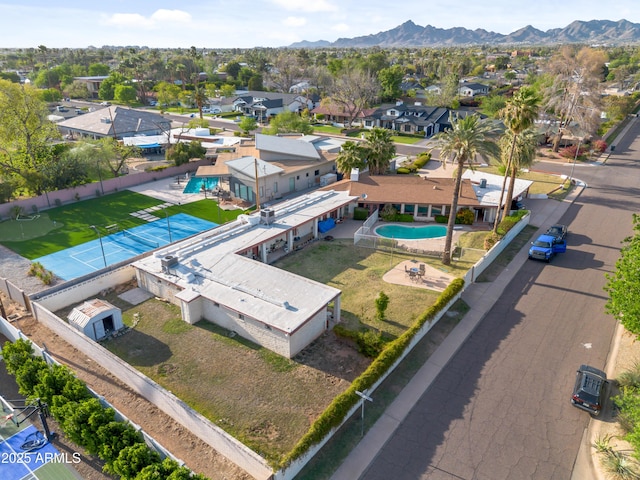 4461 E Flower St, Phoenix, AZ 85018 - aerial perspective of suburban area featuring a pool area and a mountainous background