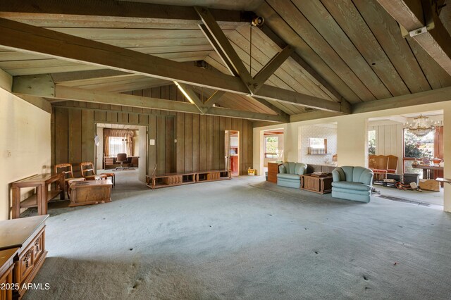 4461 E Flower St, Phoenix, AZ 85018 - miscellaneous room featuring carpet flooring, beam ceiling, a chandelier, and high vaulted ceiling
