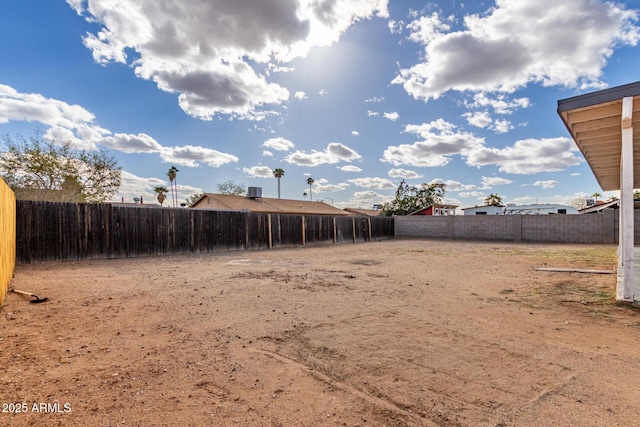 view of yard featuring a fenced backyard