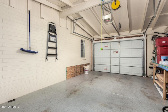 garage featuring a garage door opener