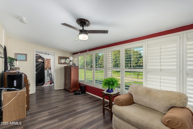 sitting room featuring ceiling fan, lofted ceiling, plenty of natural light, and dark hardwood / wood-style floors