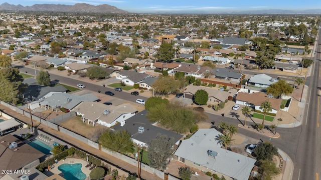 birds eye view of property featuring a mountain view