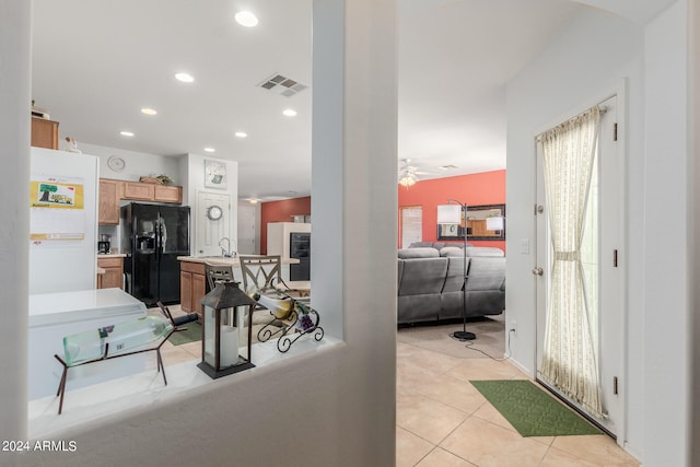 interior space featuring light tile patterned floors