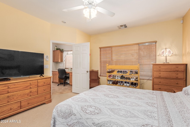 carpeted bedroom with ceiling fan