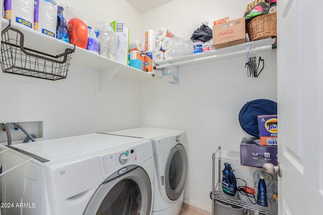 laundry room with washer and clothes dryer