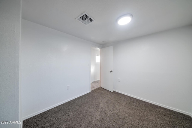 empty room with carpet floors