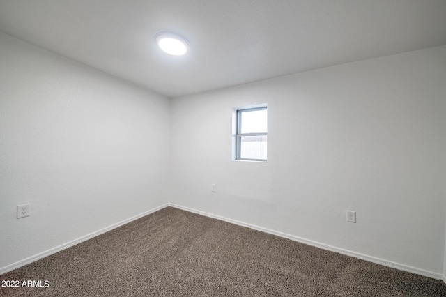 unfurnished room with carpet floors