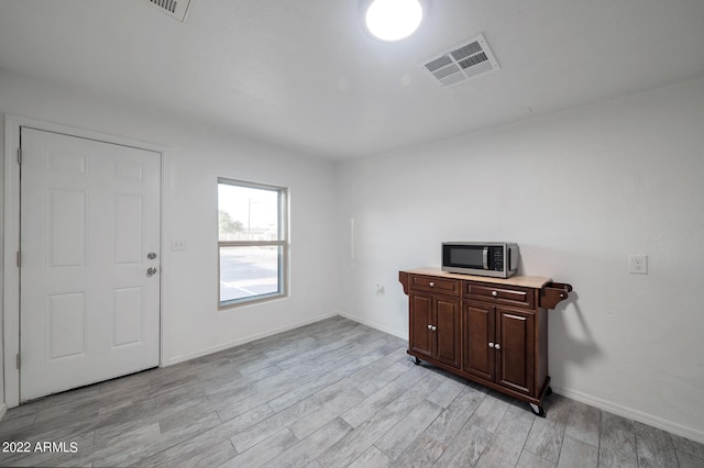 interior space with light hardwood / wood-style floors