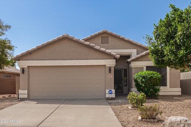 view of front of property featuring a garage