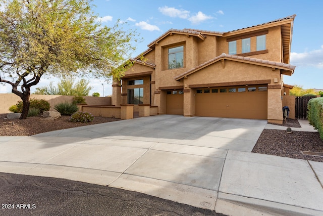 view of front of home with a garage