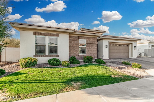 2052 E Scorpio Pl, Chandler, AZ 85249 - view of front of house featuring stucco siding, driveway, a garage, a front yard, and a tile roof