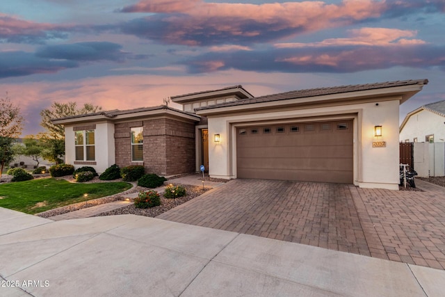 2052 E Scorpio Pl, Chandler, AZ 85249 - view of front of property featuring decorative driveway, stucco siding, and an attached garage