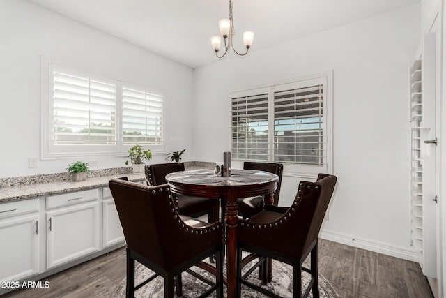 2052 E Scorpio Pl, Chandler, AZ 85249 - dining space with a chandelier and wood finished floors