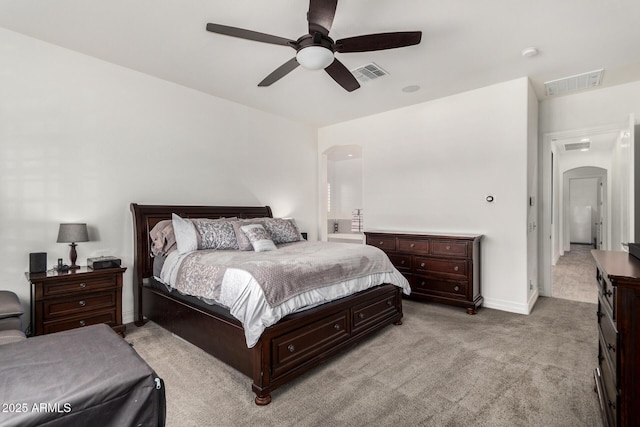 2052 E Scorpio Pl, Chandler, AZ 85249 - bedroom with arched walkways, carpet, a ceiling fan, and baseboards