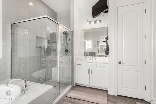 2052 E Scorpio Pl, Chandler, AZ 85249 - full bath featuring a stall shower, vanity, a bath, and wood finished floors