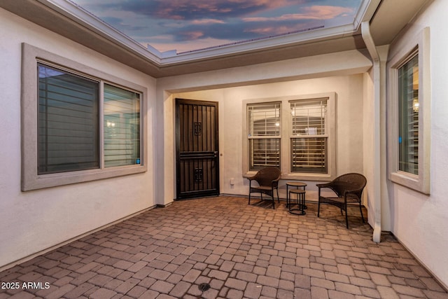 2052 E Scorpio Pl, Chandler, AZ 85249 - doorway to property featuring stucco siding and a patio