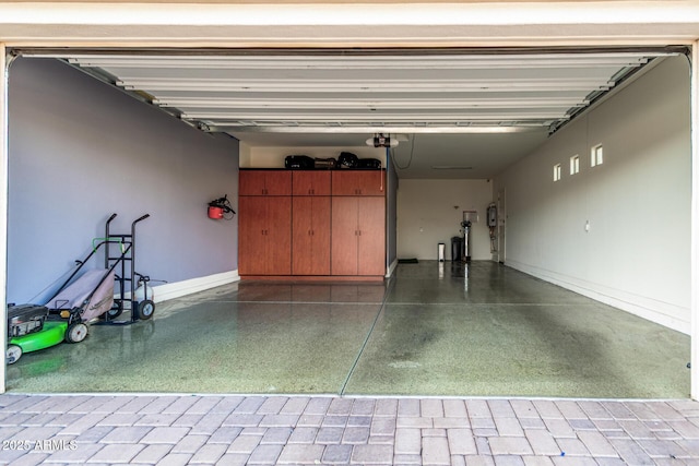 2052 E Scorpio Pl, Chandler, AZ 85249 - garage with a garage door opener and baseboards