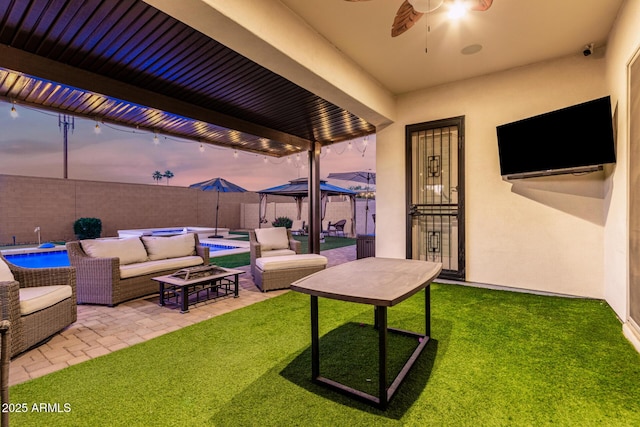 2052 E Scorpio Pl, Chandler, AZ 85249 - fenced backyard featuring outdoor lounge area, a gazebo, a patio, and a ceiling fan