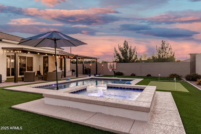 2052 E Scorpio Pl, Chandler, AZ 85249 - view of pool featuring an in-ground hot tub, an area to practice putting, a fenced backyard, and a patio area