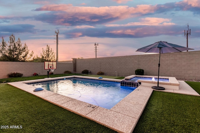 2052 E Scorpio Pl, Chandler, AZ 85249 - pool at dusk featuring an in-ground hot tub