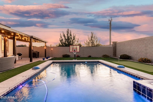 2052 E Scorpio Pl, Chandler, AZ 85249 - view of swimming pool featuring an area to practice putting, a fenced backyard, and a patio