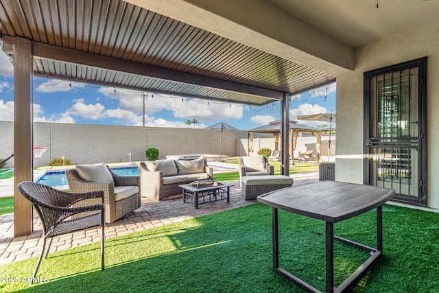 2052 E Scorpio Pl, Chandler, AZ 85249 - fenced backyard featuring an outdoor hangout area, a gazebo, and a patio