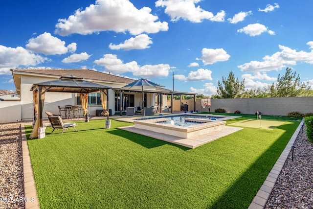 2052 E Scorpio Pl, Chandler, AZ 85249 - back of property with a gazebo, a putting area, a patio, stucco siding, and a pool with connected hot tub