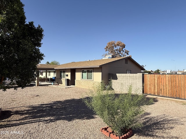 1841 N Wilbur Cir, Mesa, AZ 85201 - view of front of property with brick siding and roof with shingles