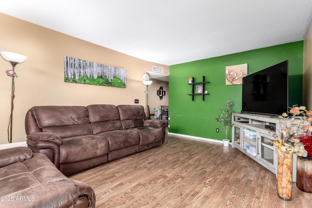 1807 E Jamaica Ave, Mesa, AZ 85204 - living room featuring wood finished floors and baseboards